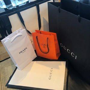 Various brands & sizes of shopping bag.